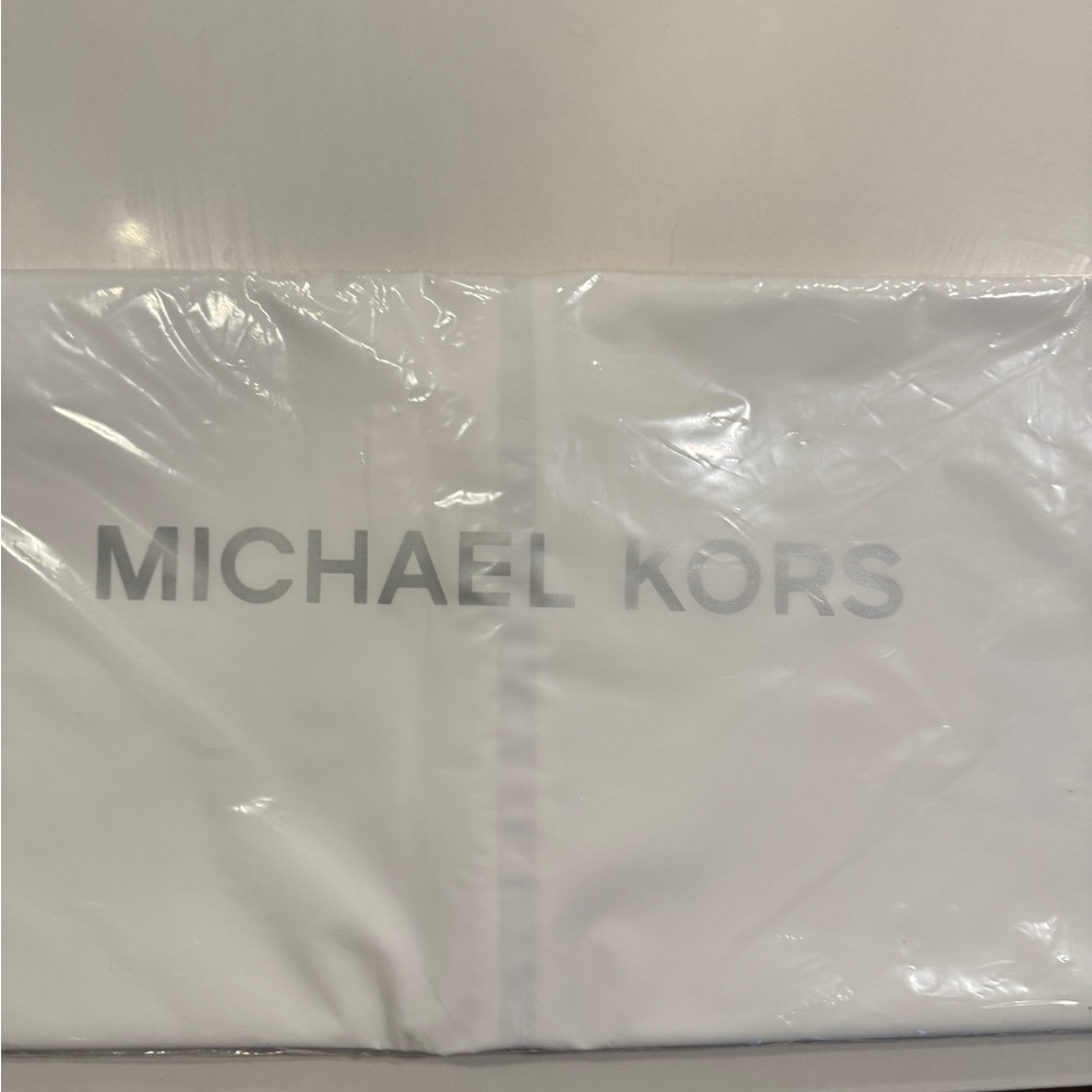 Never opened Michael Kors garment bag